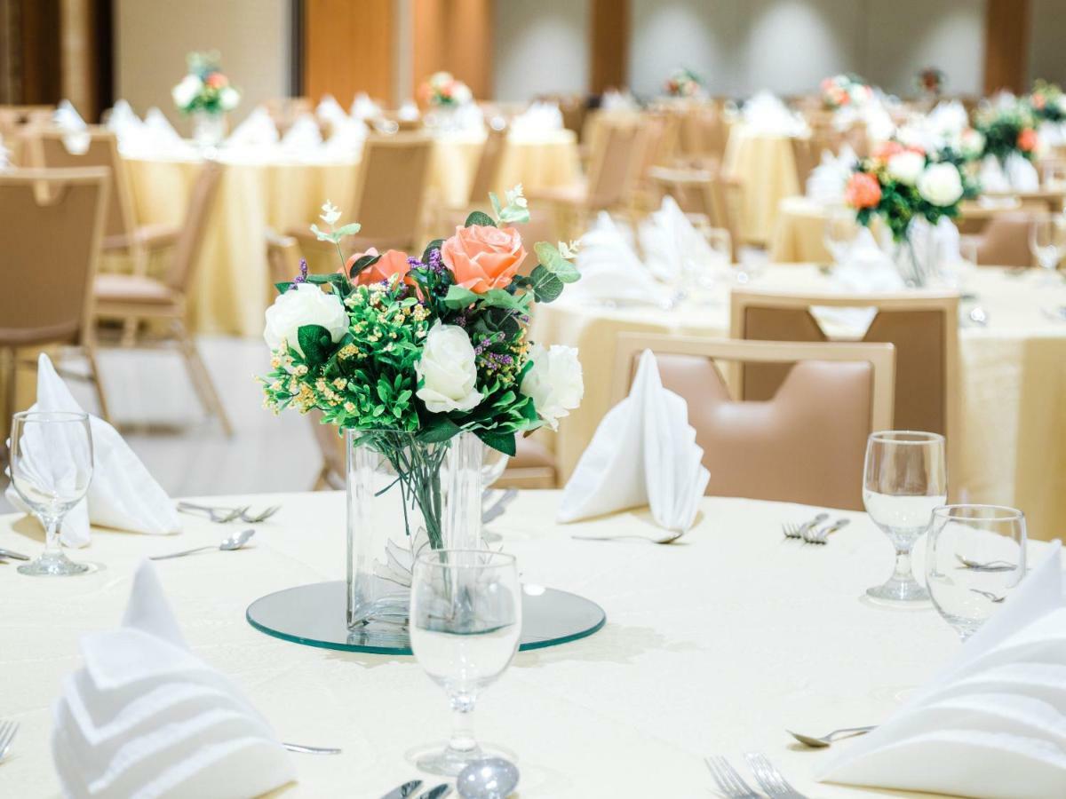Henann Palm Beach Resort Balabag  Экстерьер фото A table set for a formal dinner