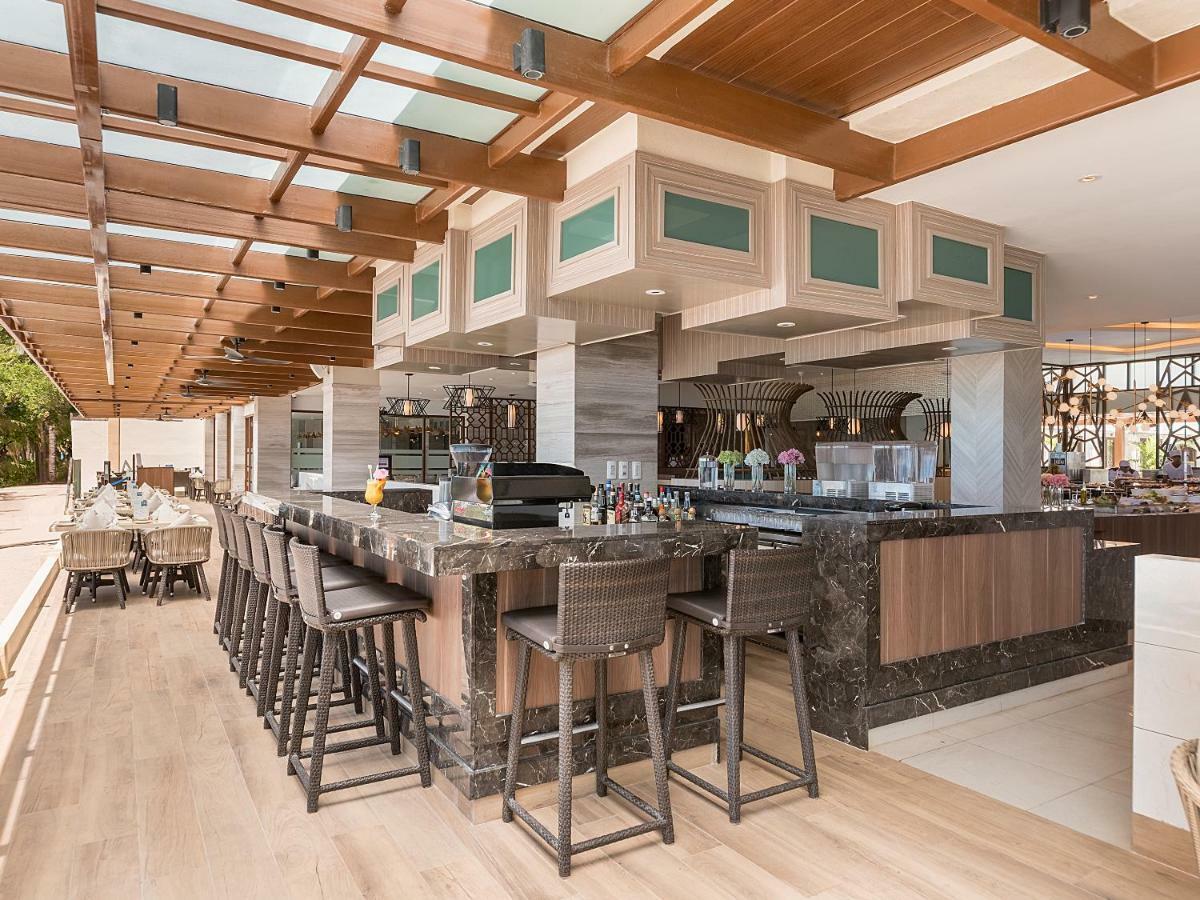 Henann Palm Beach Resort Balabag  Экстерьер фото The kitchen